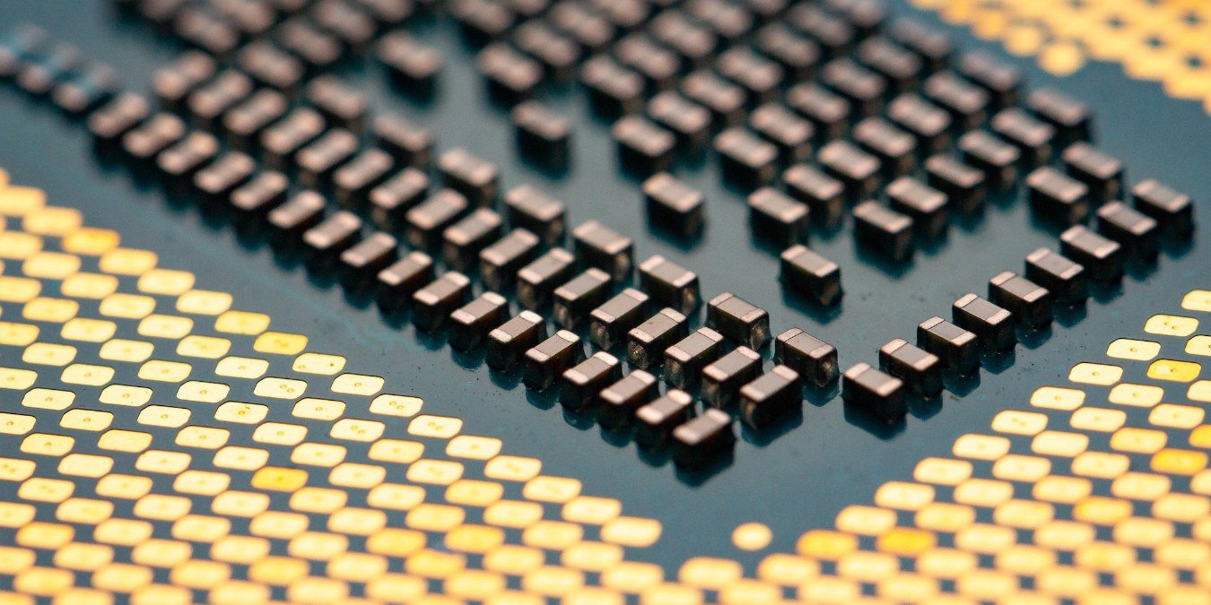 Close up of a desktop CPU showing multiple metal pins