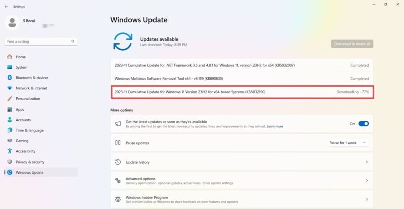 Windows 11 23H2 version KB5032190 being downloaded.