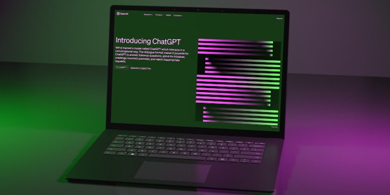 Laptop with an article about ChatGPT on it.