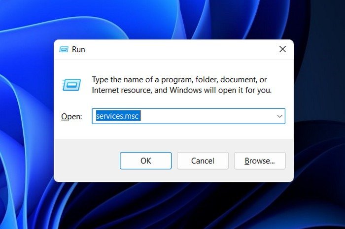Typing "services.msc" in Run window.