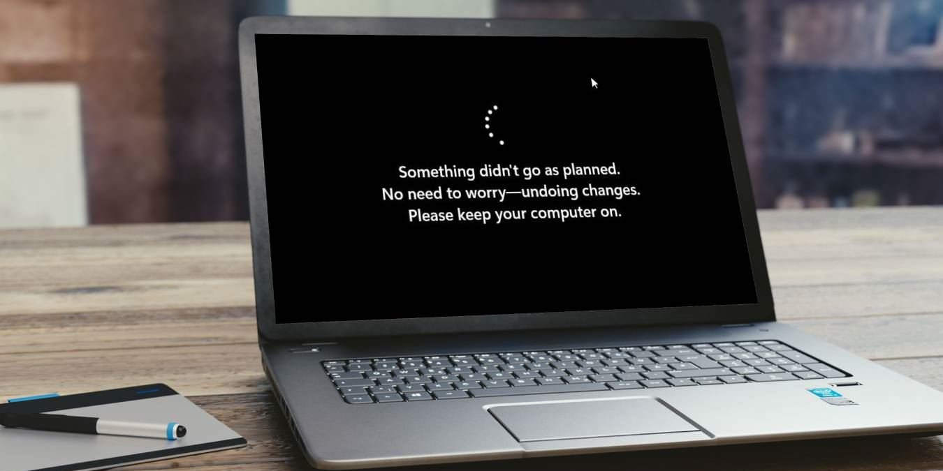 A laptop showing "Something didn't go as planned" in Windows error